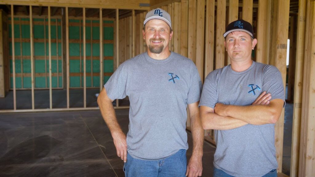 Business owners on construction site.